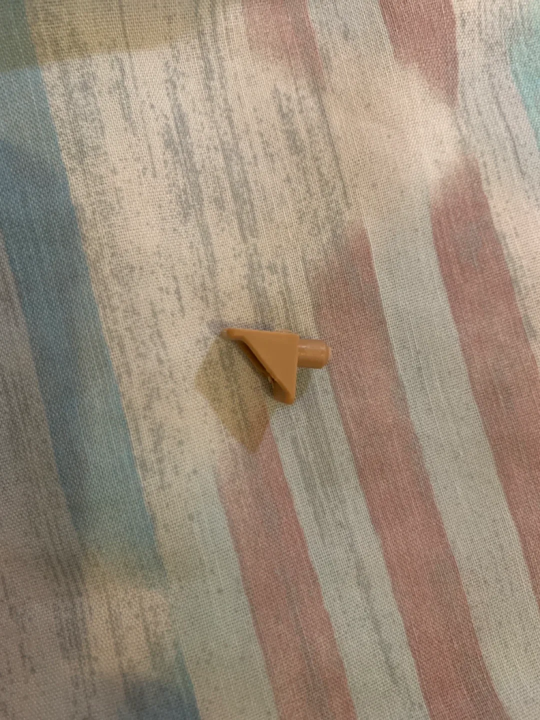 Small Tan Plastic Part thumbnail