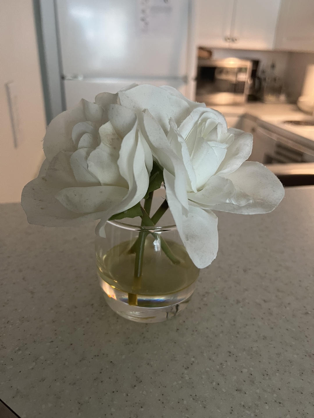 Artificial White Flowers in Glass Vase