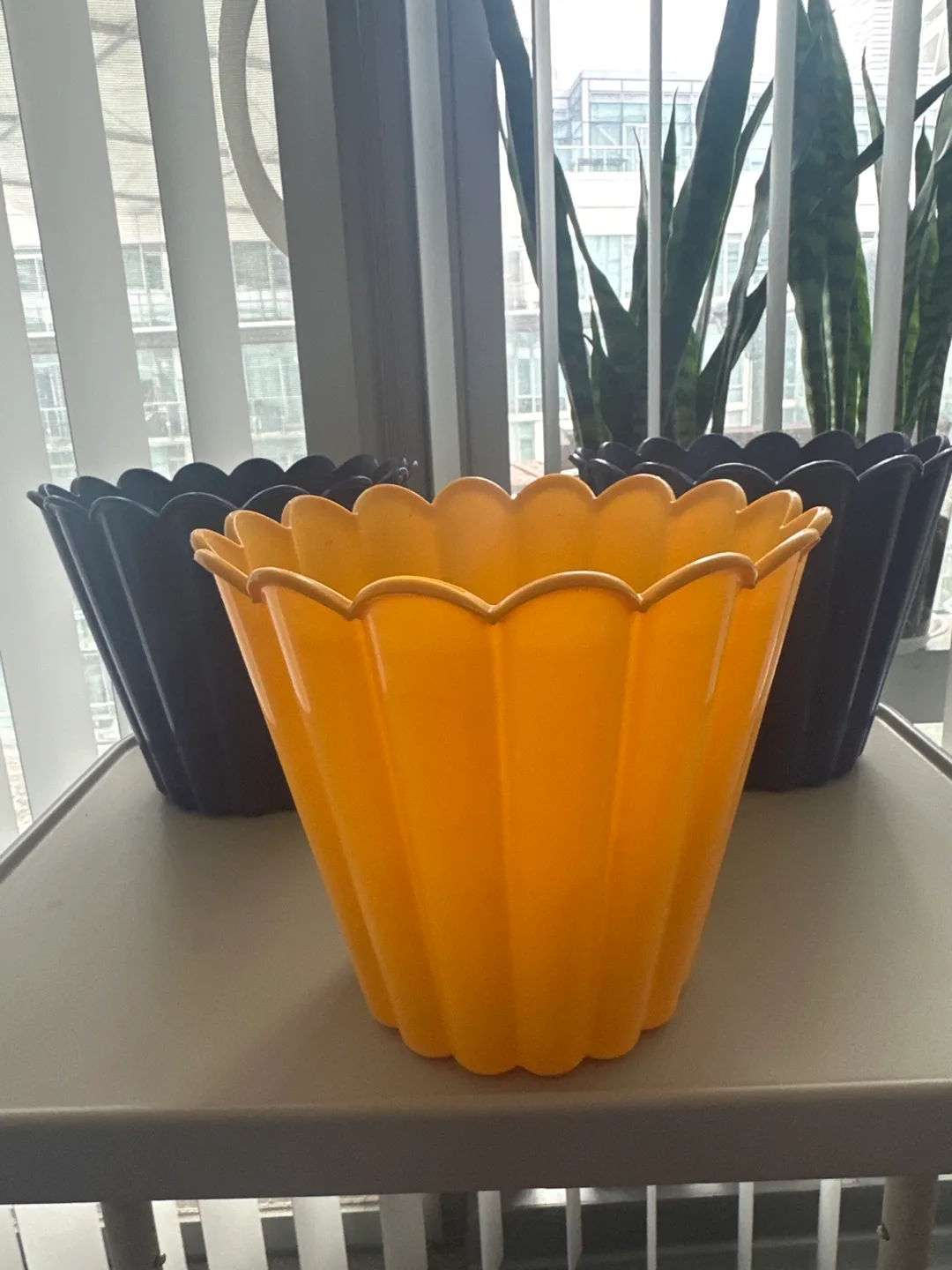 Lot of 3 6” plant planters (1 yellow, 2 purple) thumbnail