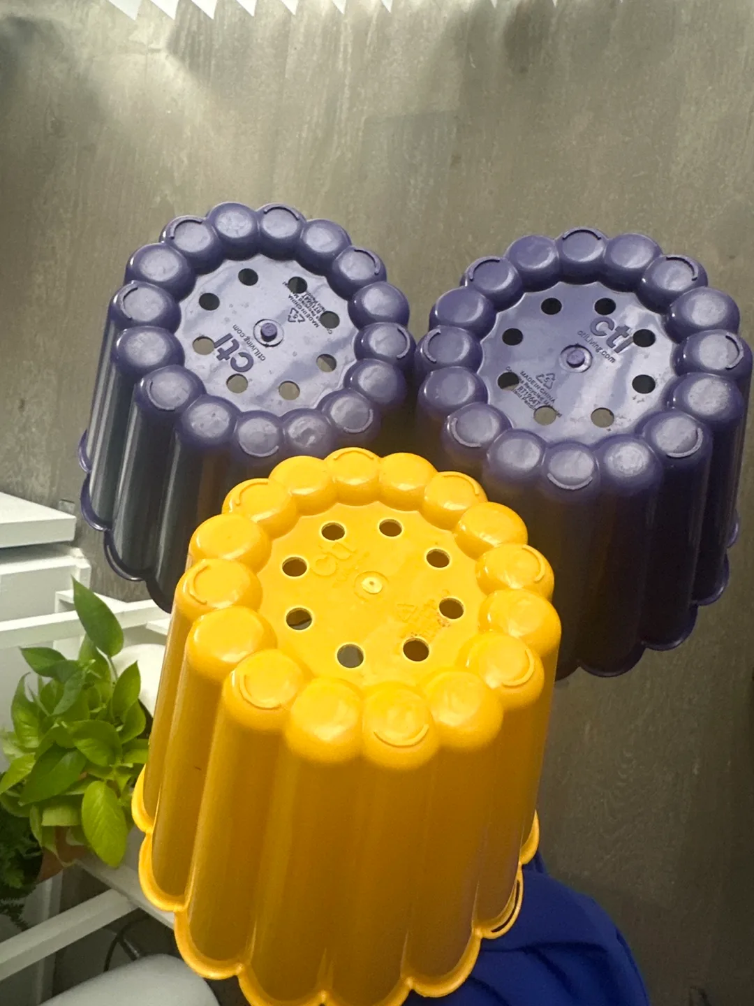 Lot of 3 6” plant planters (1 yellow, 2 purple) image indicator(7)