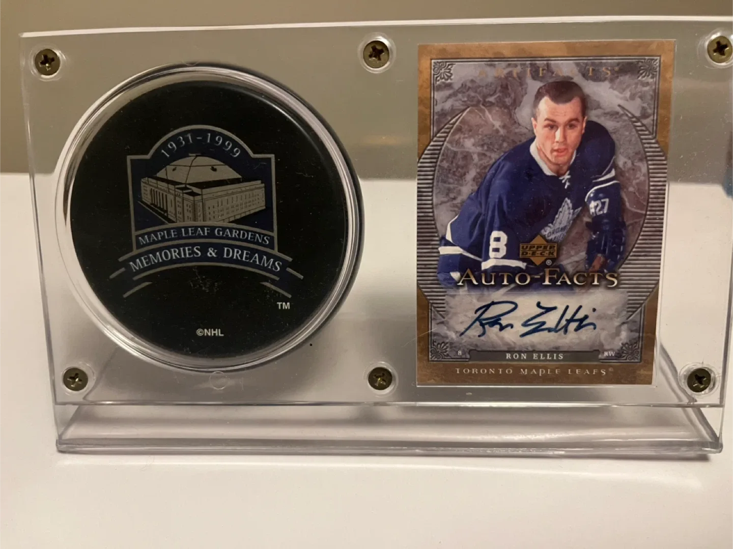 Lindsay’s own Ron Ellis autographed card and puck set. thumbnail