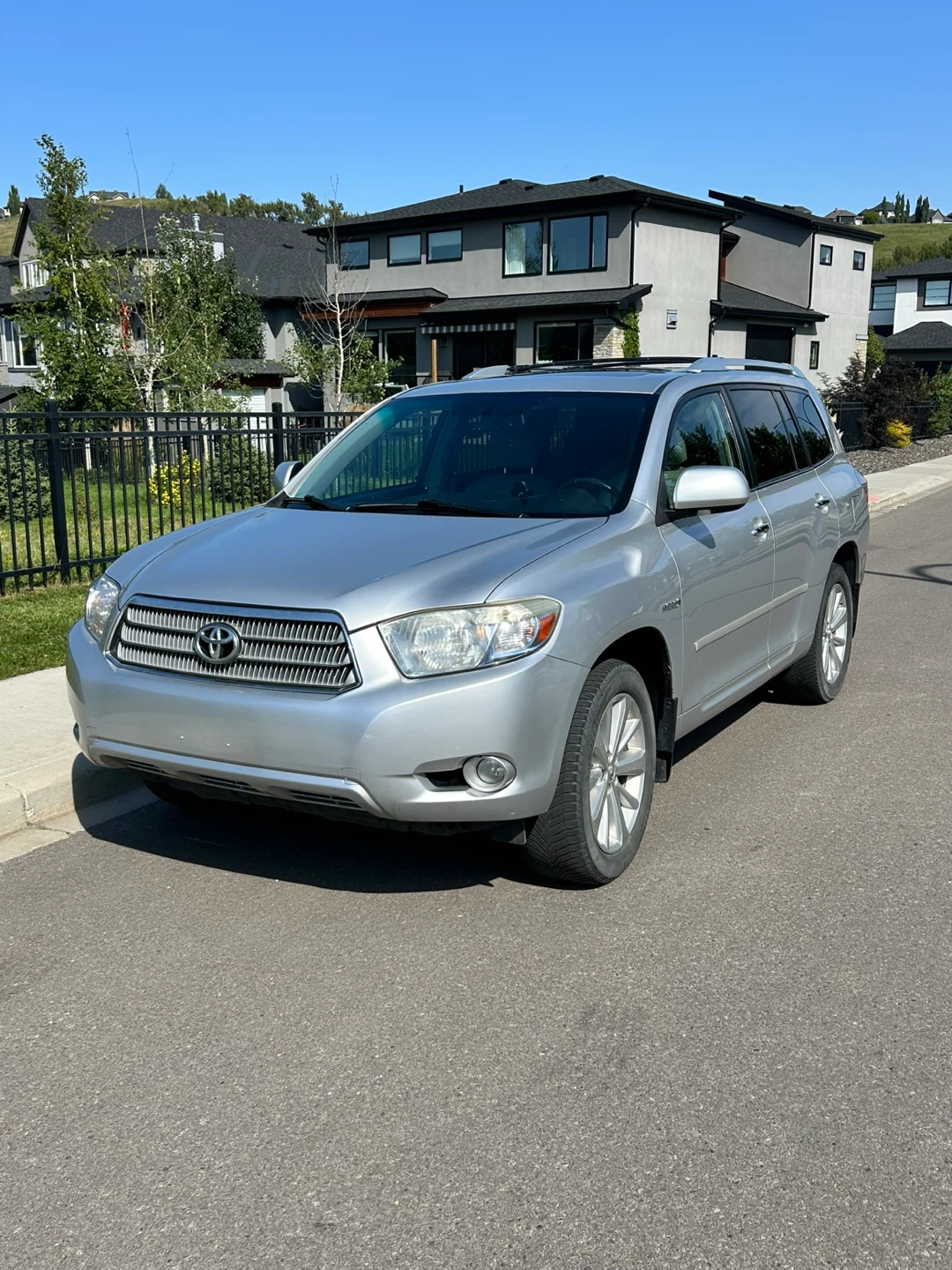 Silver Toyota Highlander Hybrid SUV