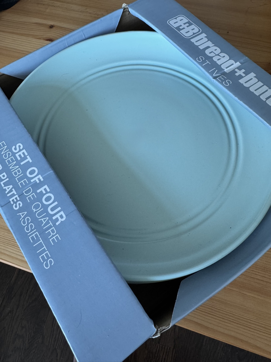 Set of Four Plates and bowl