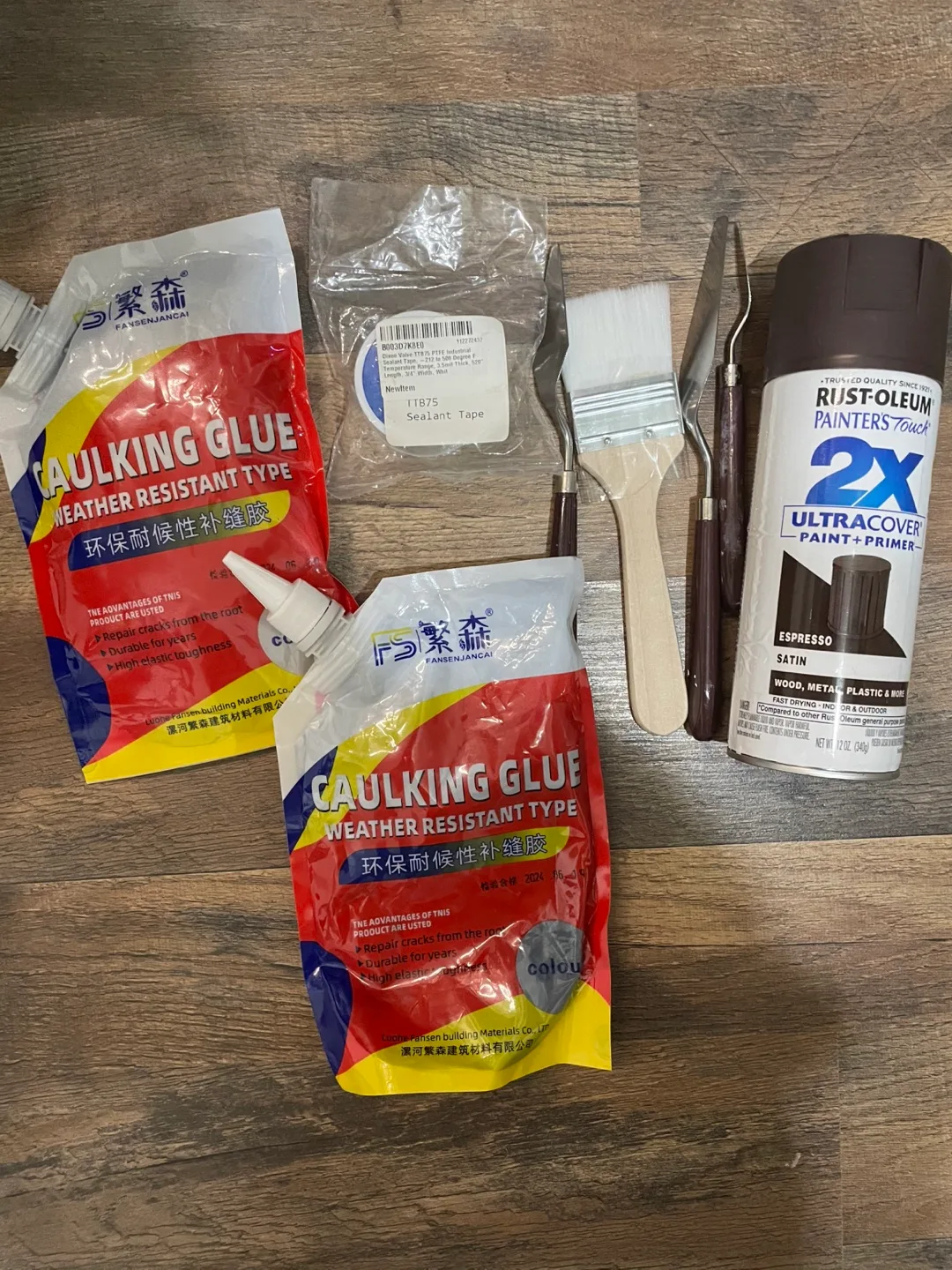 Caulking Glue, Sealant Tape, Paint, and Brushes thumbnail