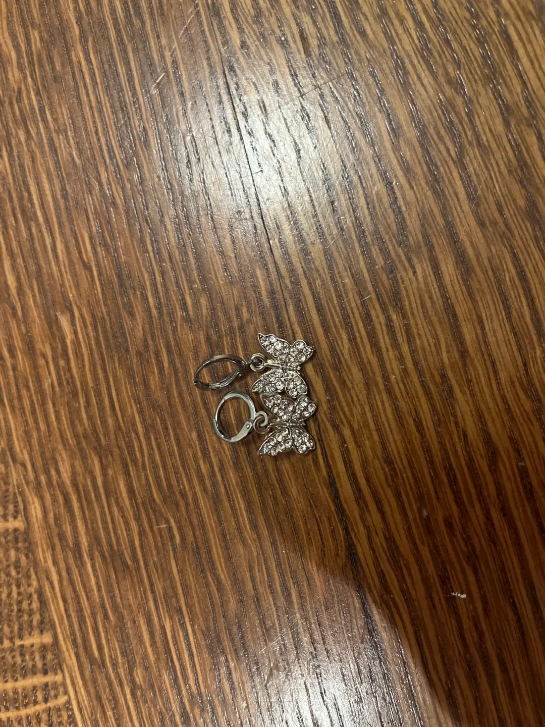 Silver dangling butterfly earrings thumbnail