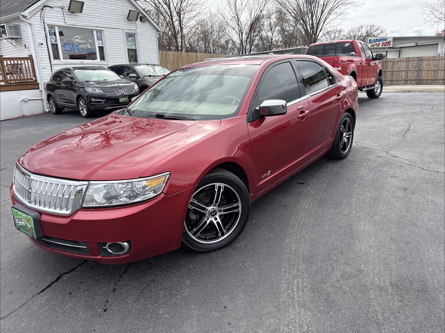 Red Lincoln MKZ Sedan