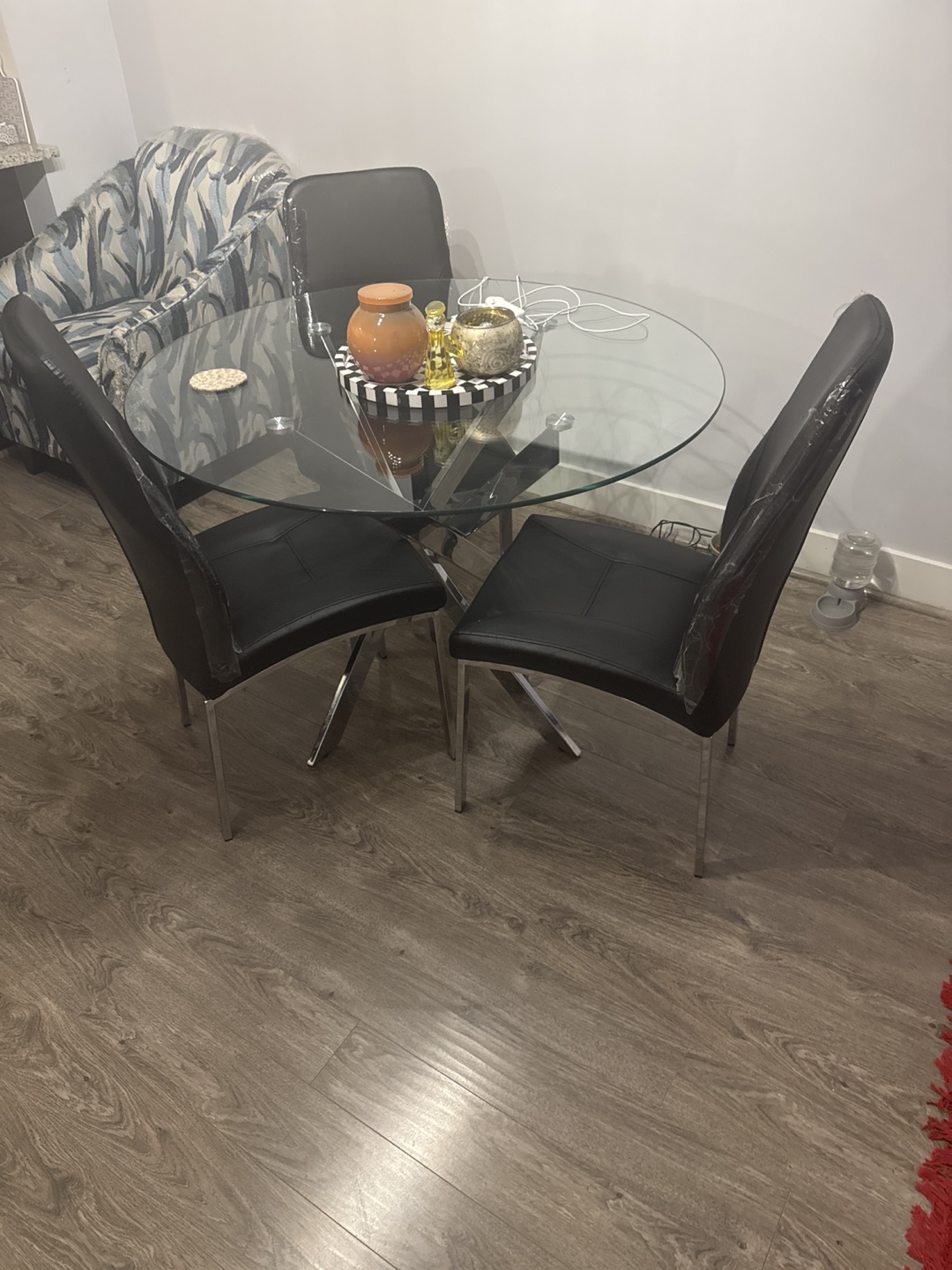 Glass Top Dining Table with 4 Black Chairs