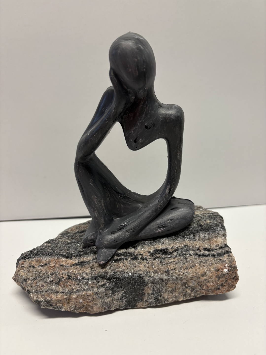 Handmade thinker statue on stone base made of Jesmonite