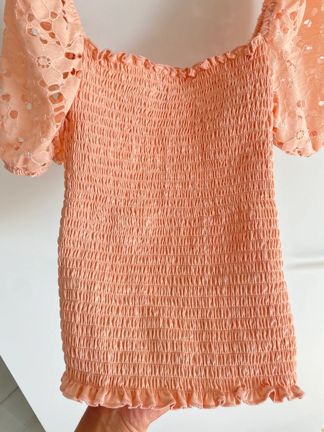 Peach smocked top with puff sleeves image indicator(3)