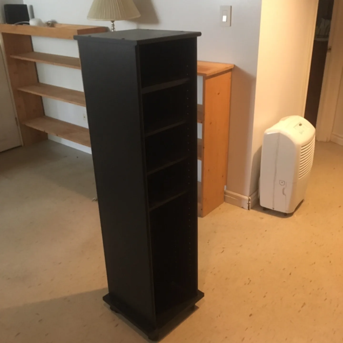 Black Rotating Media Tower on wheels