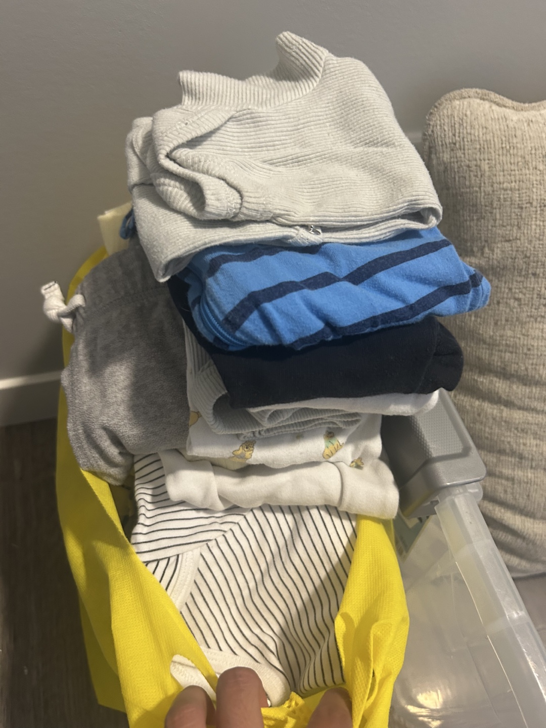 Overflowing bag of baby clothes 6-9 mo