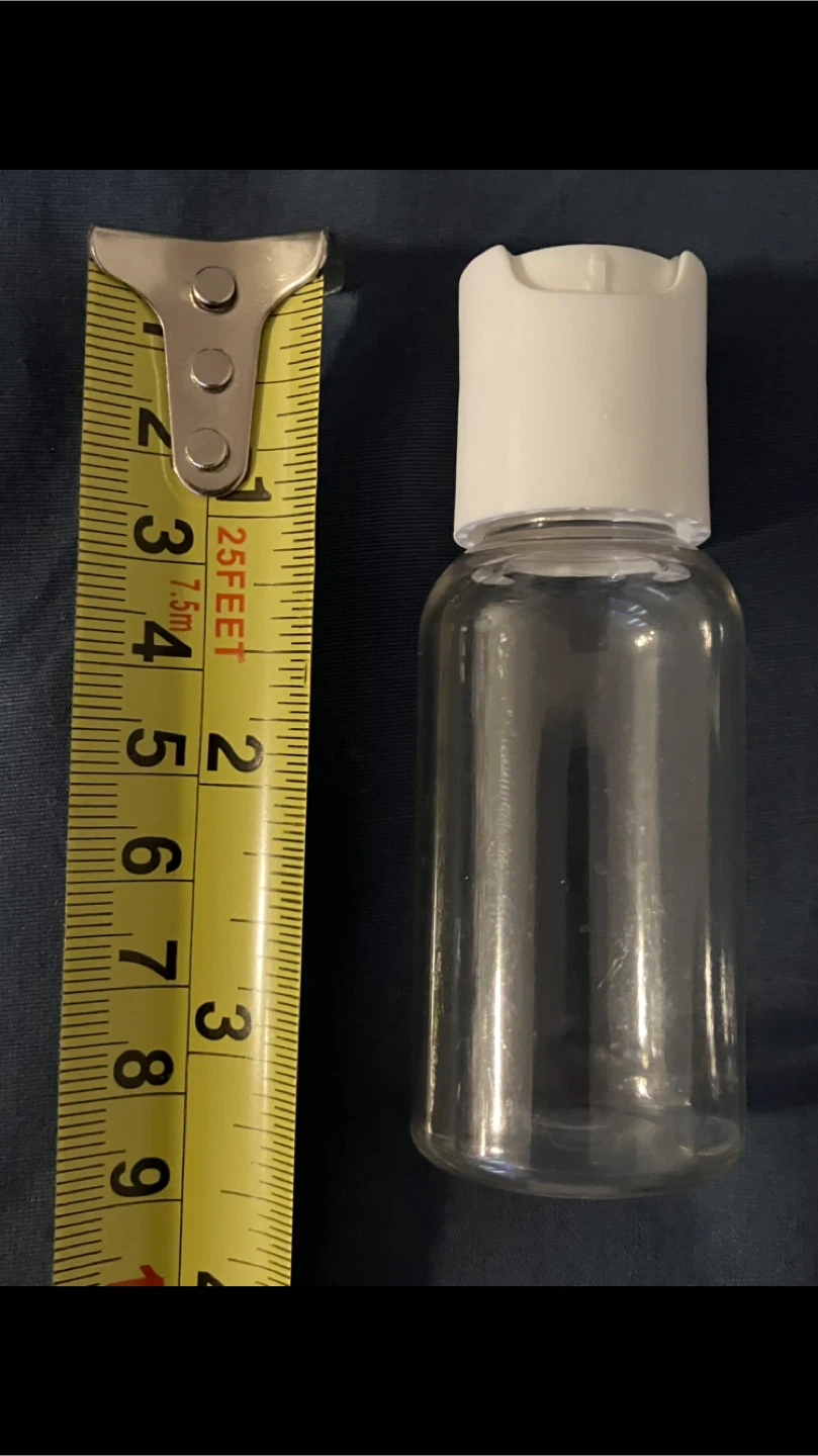 Free Small Empty Travel Bottle-Does Not Squeeze Well