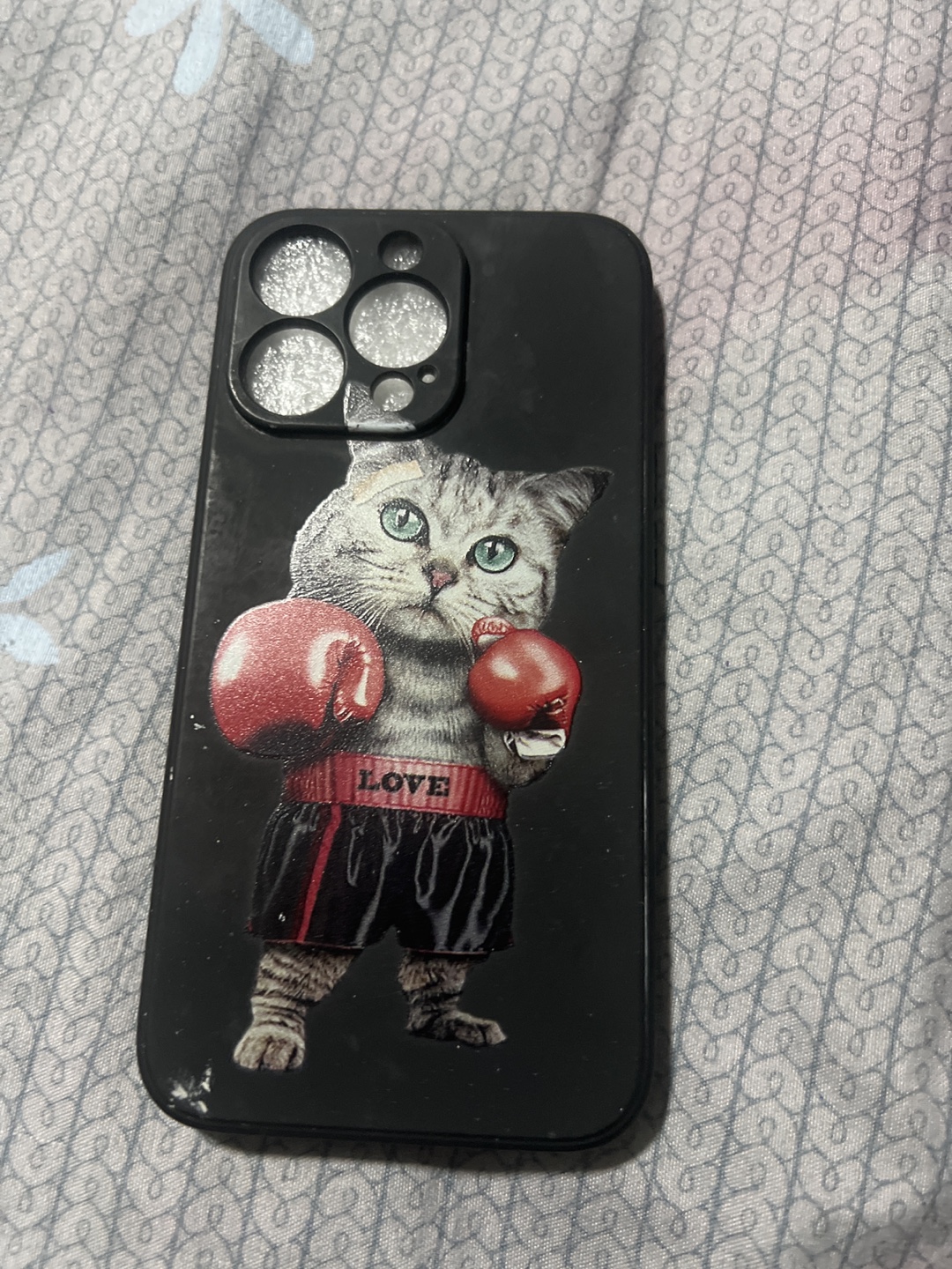 iPhone case with cat boxer design
