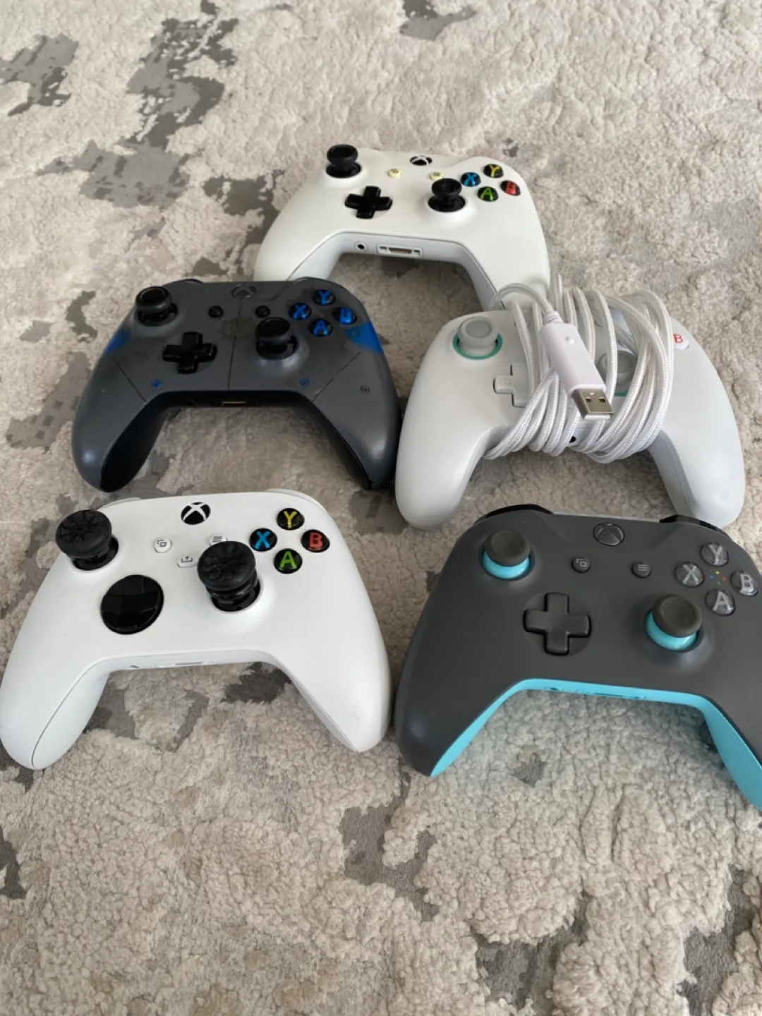 Xbox One S, 5 controllers, headset, and games image indicator(3)