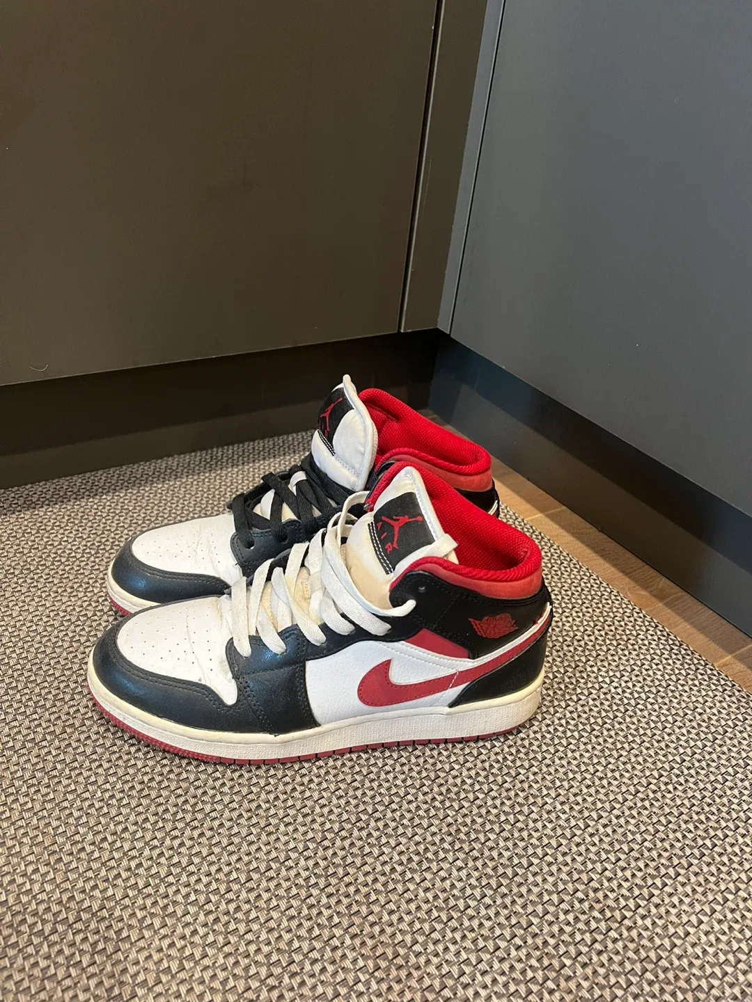 Air Jordan 1 Mid Black White Red Sneakers thumbnail