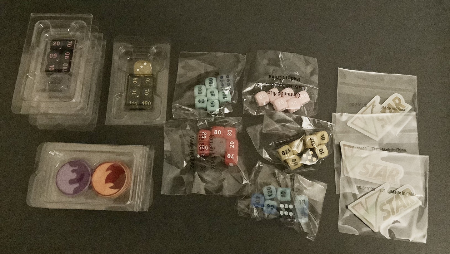 Assorted Pokémon TCG accessories (dies, counters, markers)