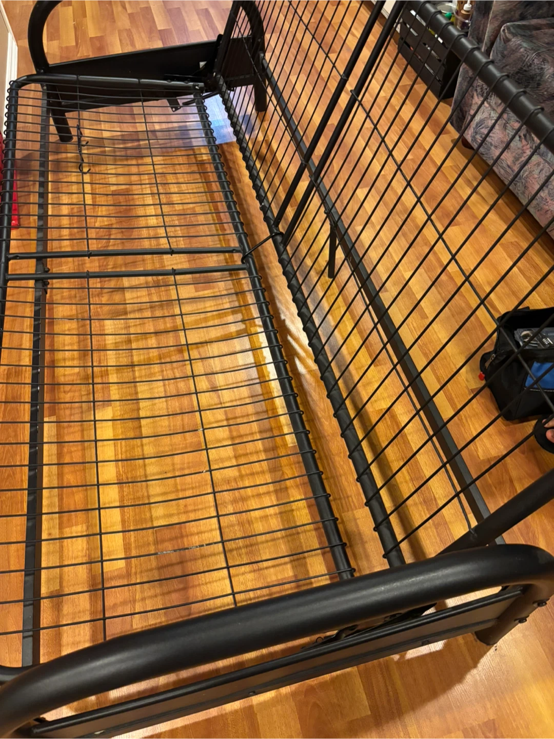 Futon (metal frame) with black mattress