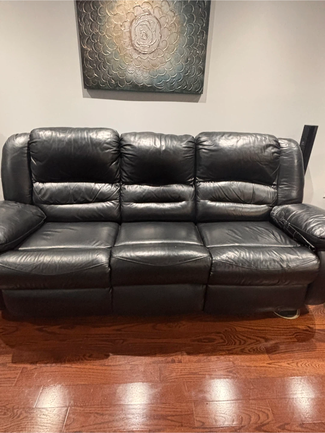 Black Leather Reclining Sofa