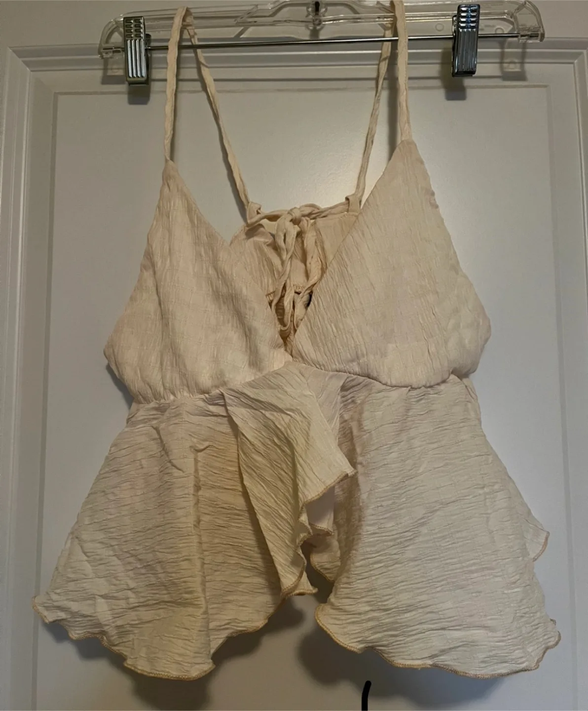 Cream-coloured ruffled crop top image indicator(2)