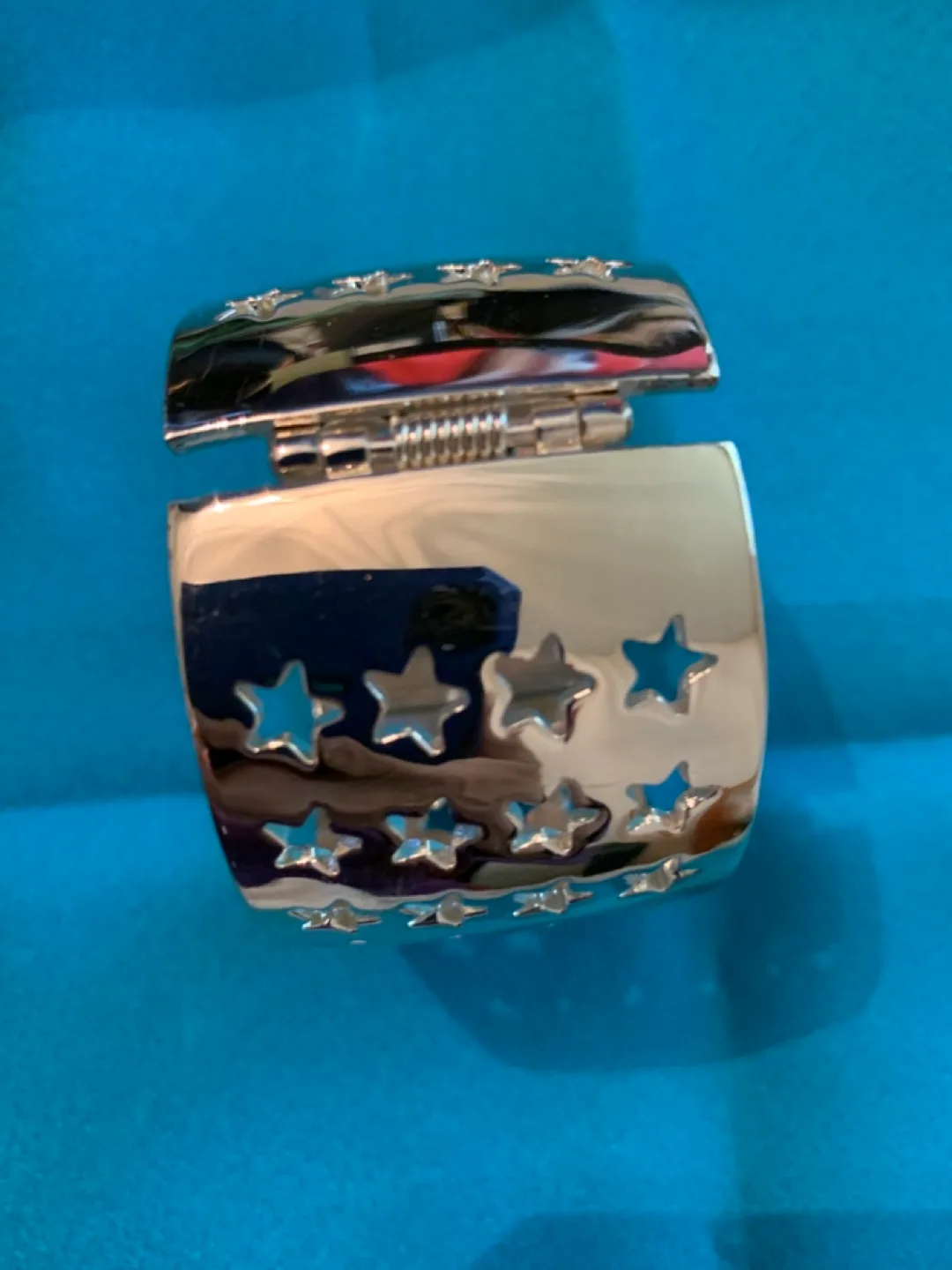 Gold tone Cuff Bracelet with Star Cutouts image indicator(2)