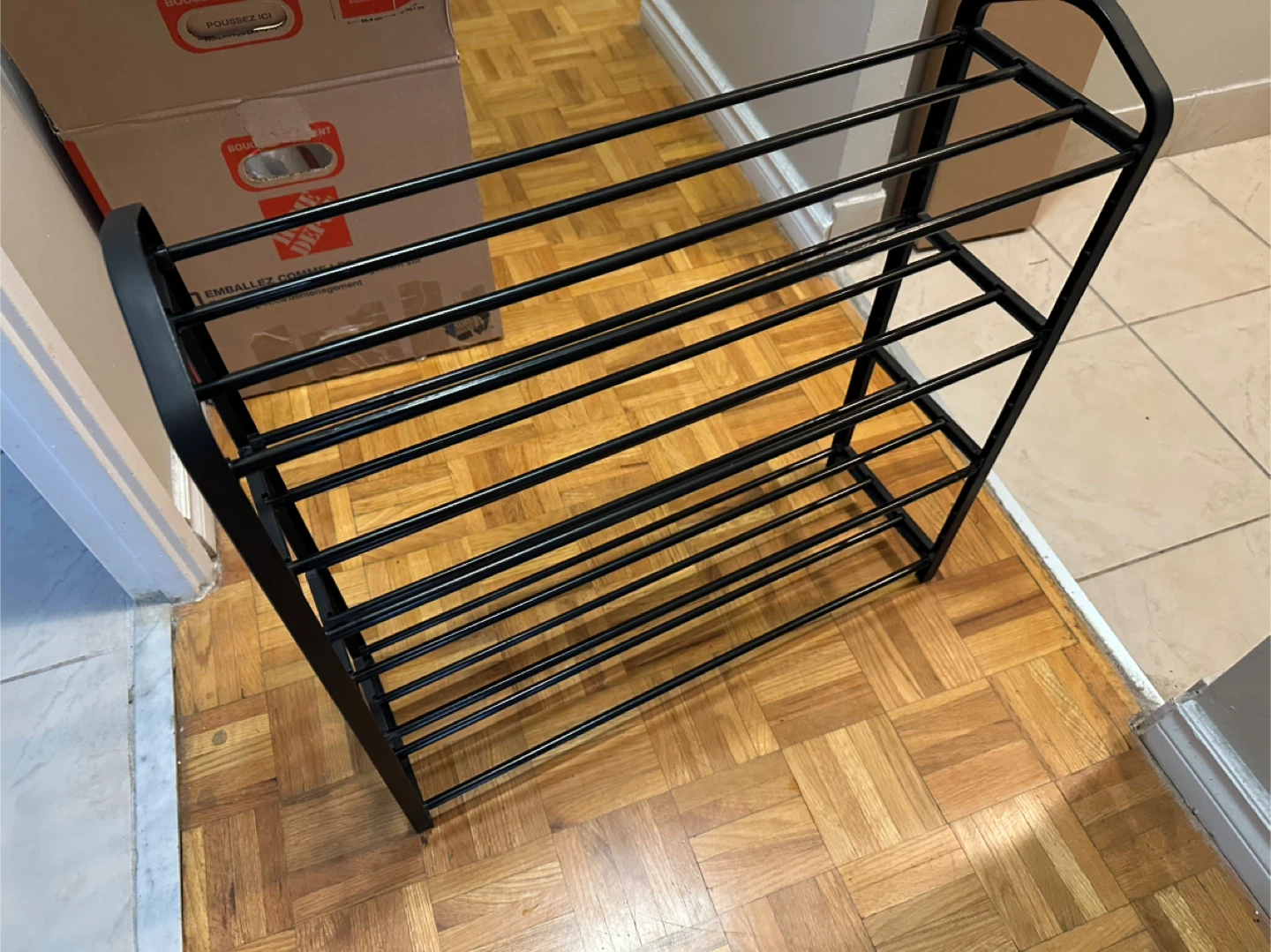 Black shoe rack. Four tiers - 60 x 20 x 55cm