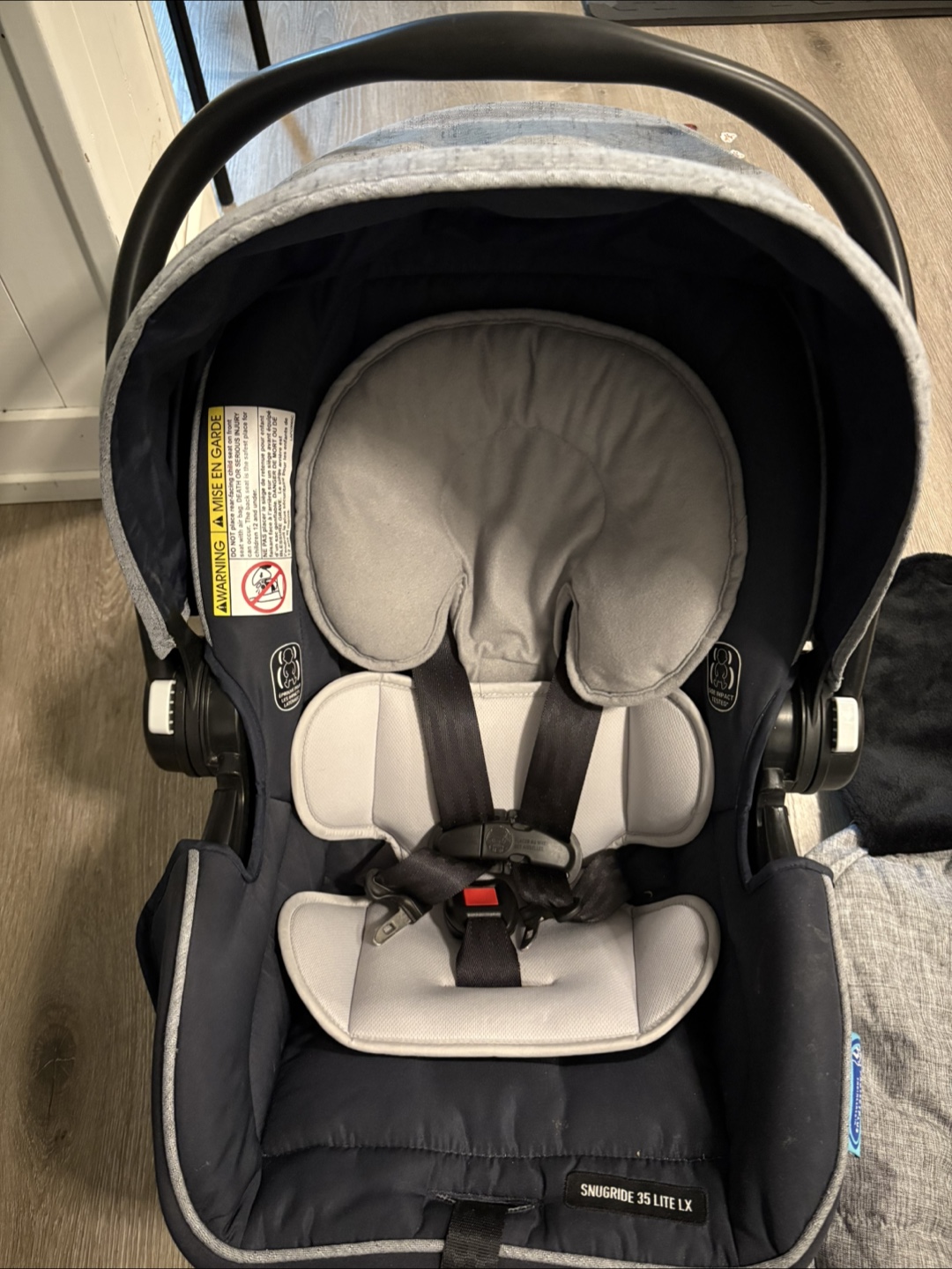 Graco SnugRide 35 Lite LX Infant Car Seat with winter cover