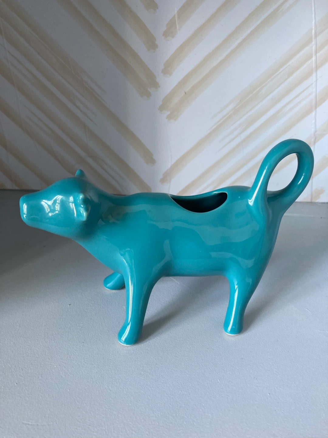 Teal ceramic cow creamer