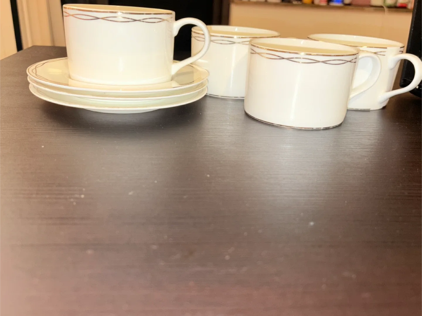 Set of 4 White Cups and Saucers