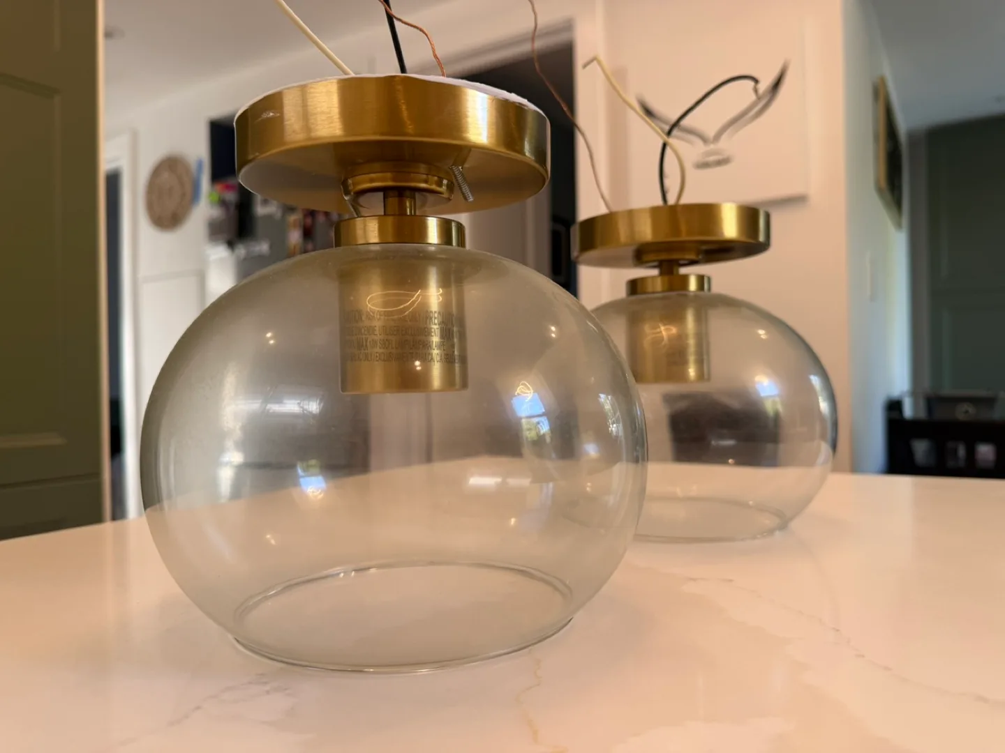 Two pendant lights with glass globe image indicator(3)