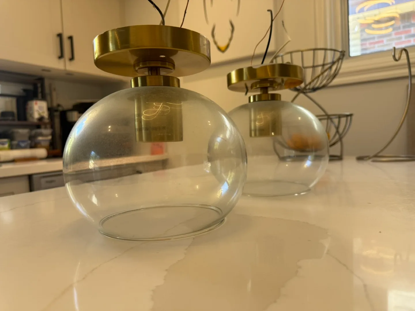Two pendant lights with glass globe image indicator(4)