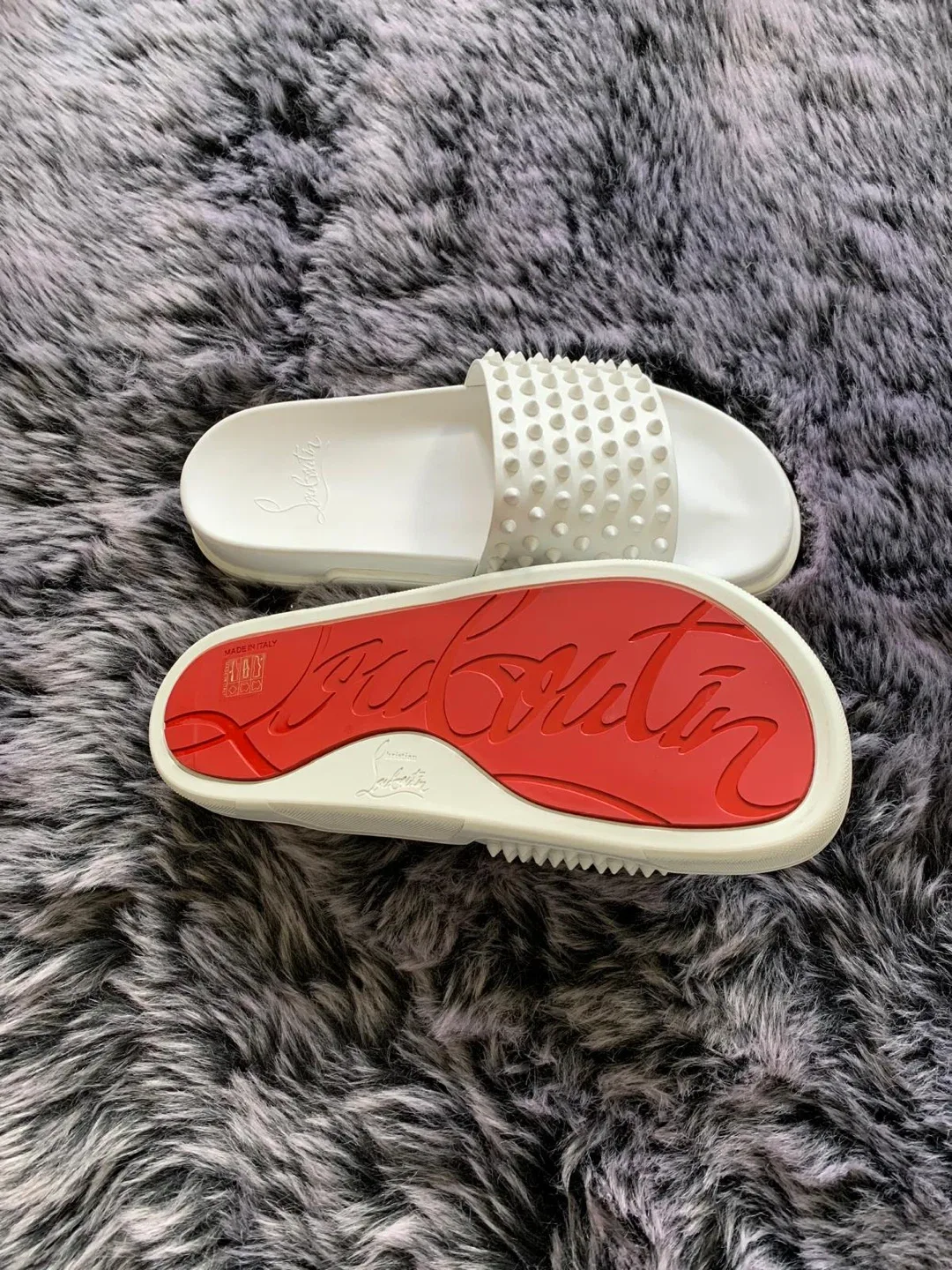 Christian Louboutin White Spiked Slides image indicator(7)