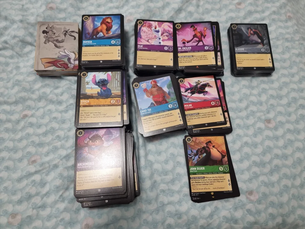 LORCANA RARE CARDS + BULK LOT ~800 Cards for $500 OBO image indicator(7)