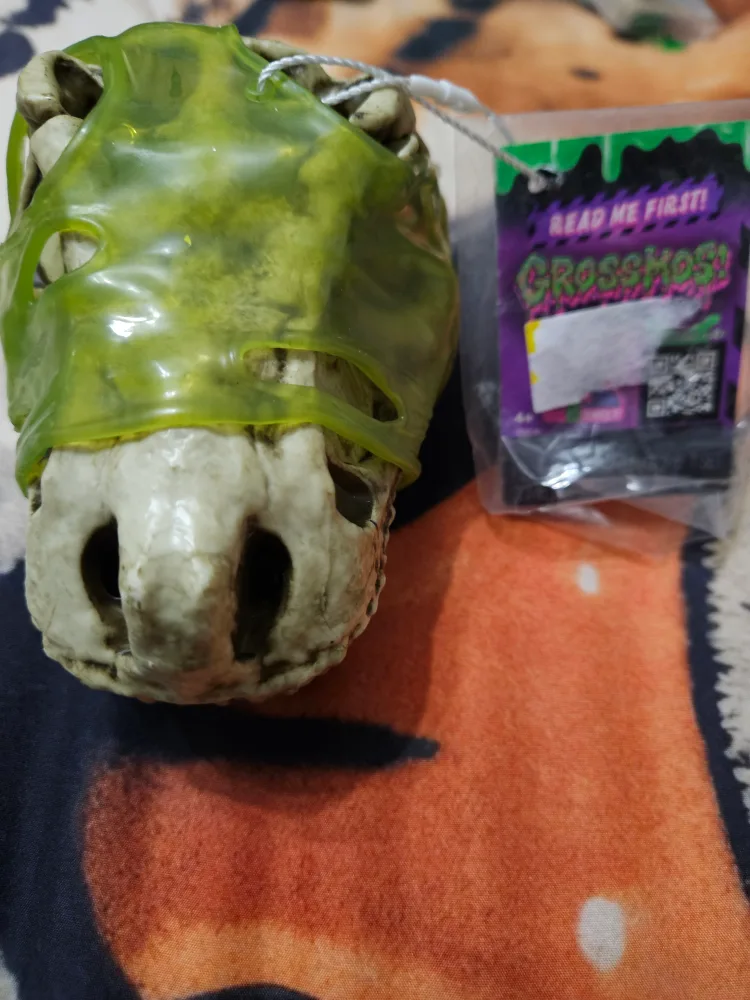 Gross Ghost Dinosaur Head Toy thumbnail