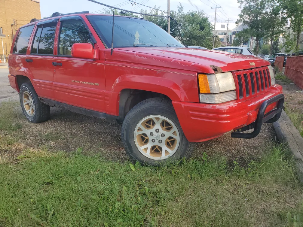 Red 96 Jeep Grand Cherokee thumbnail