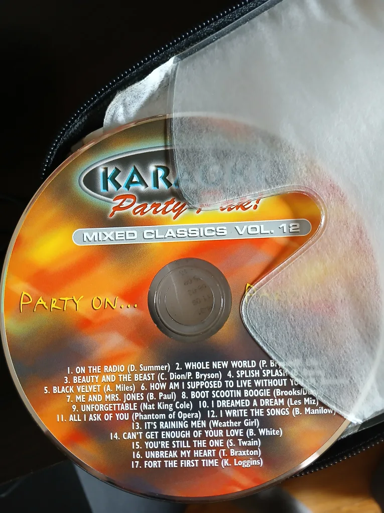 Large Karaoke CD Collection with Free Mic image indicator(7)