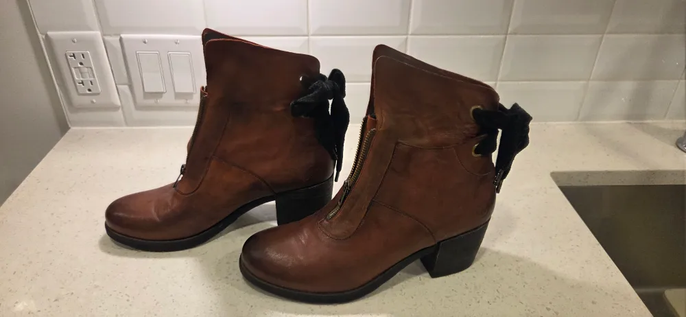 Casta  Brown Leather Ankle Boots with black bow image indicator(3)