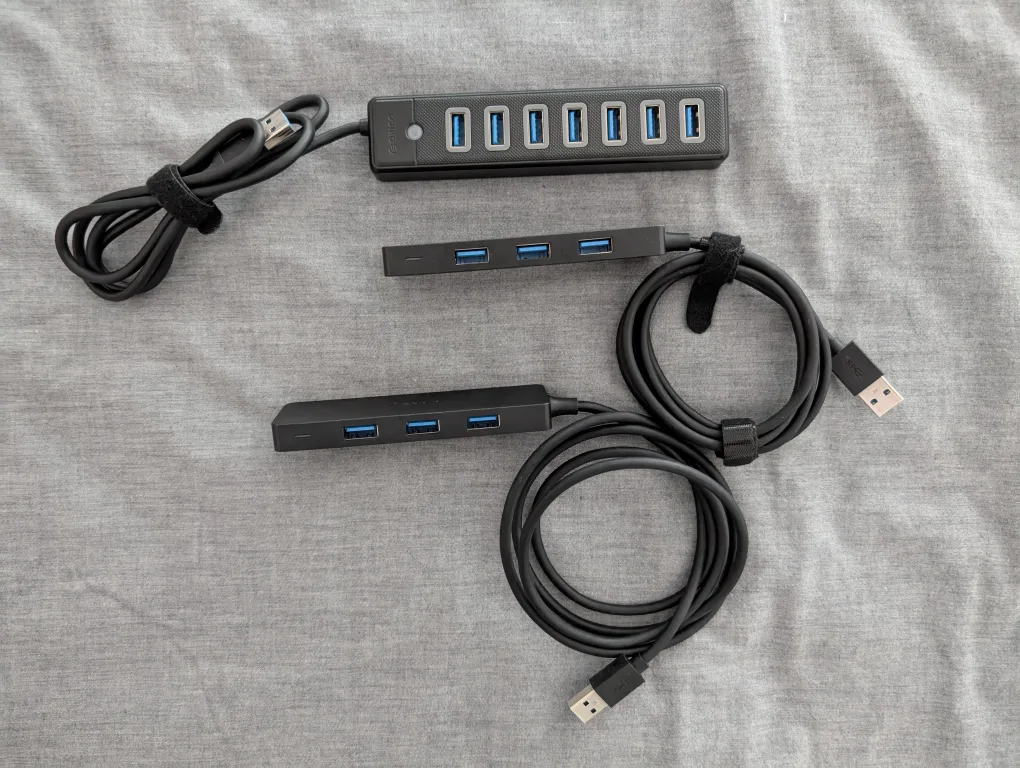 Assorted Cables, USB Hubs, Power Bars and White Noise Machine image indicator(4)