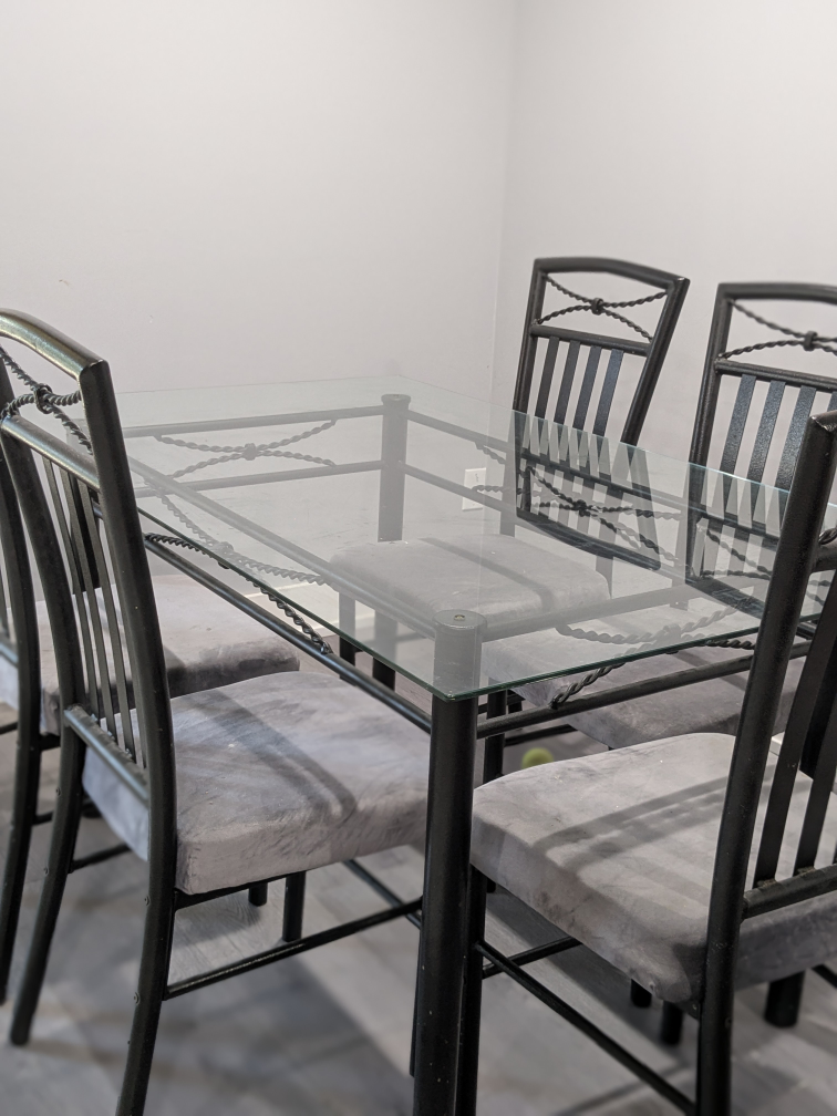 Glass Top Dining Table with 6 Chairs.
