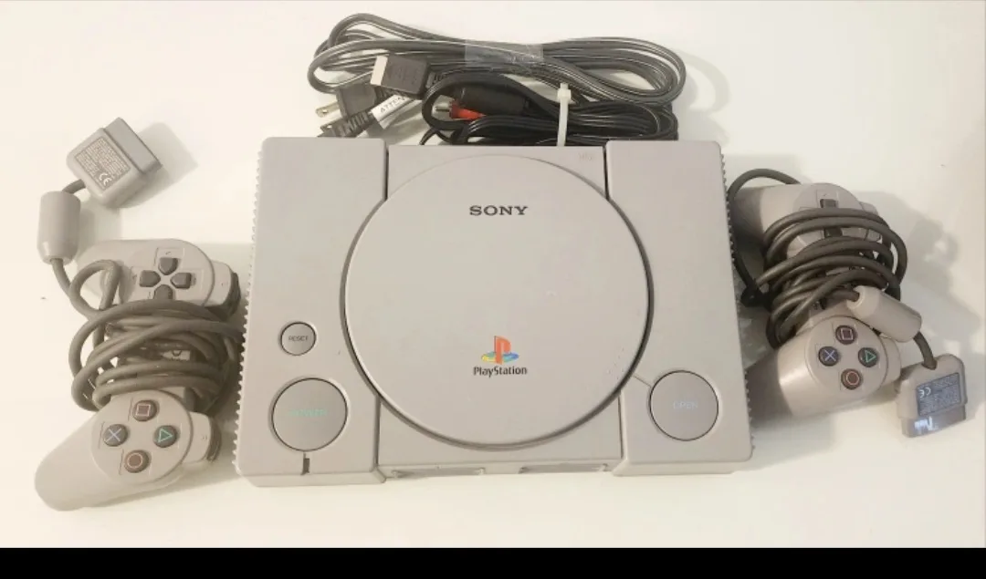 Sony Playstation Console with 2 Controllers image indicator(4)