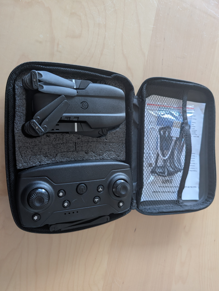 Black foldable drone with remote control - photo 2