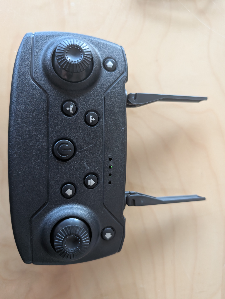 Black foldable drone with remote control - photo 4