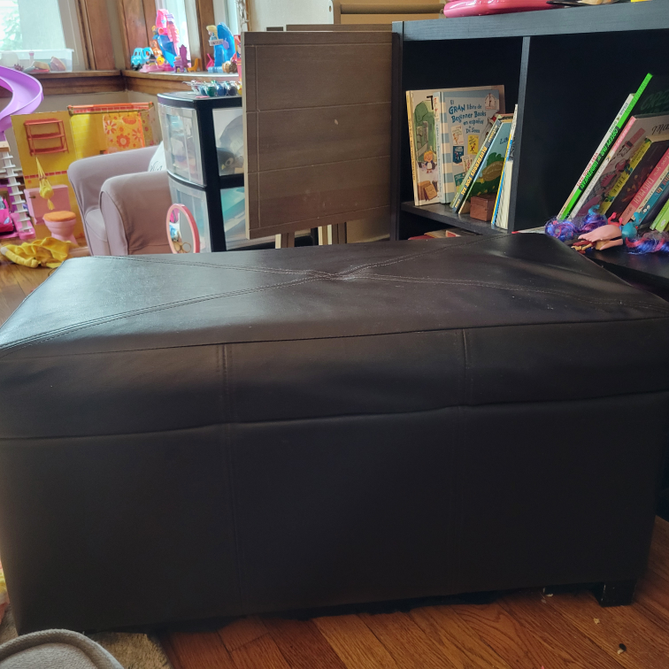 Brown, faux leather ottoman with storage