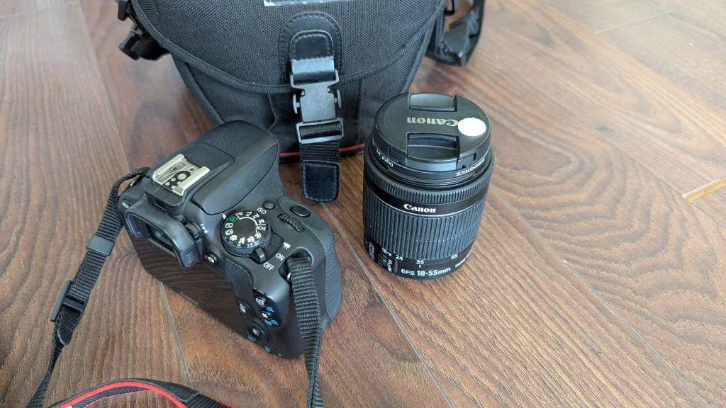 Canon EOS Rebel SL1 DSLR Camera + 18–55mm Lens + Camera Bag image indicator(7)