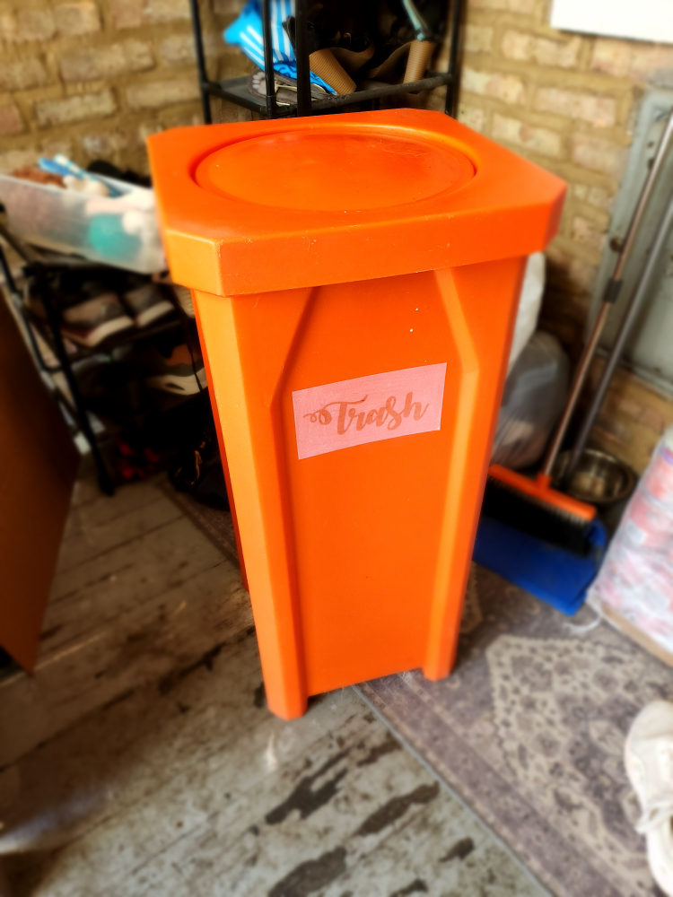 22 gallon orange square trash receptacle with a bug barrier lid