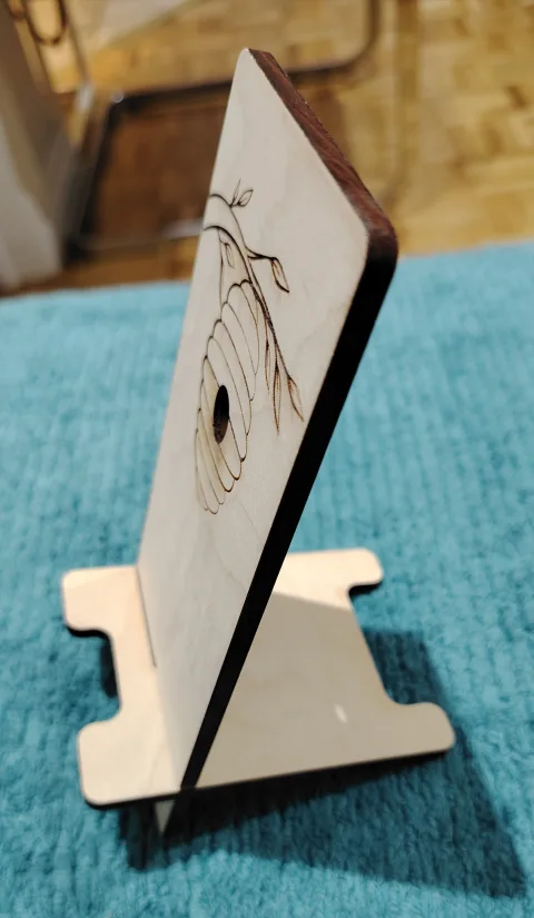 Wooden Phone Stand with Beehive Design image indicator(2)
