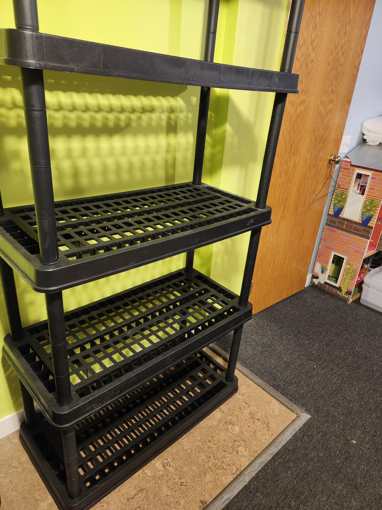 2 Black Plastic Shelving Units