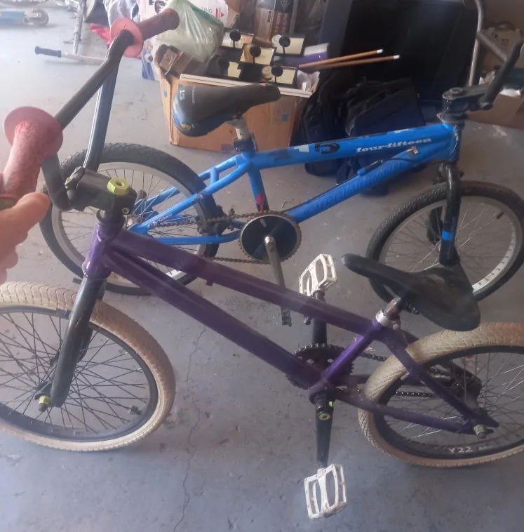 Two BMX Bikes - Purple and Blue thumbnail
