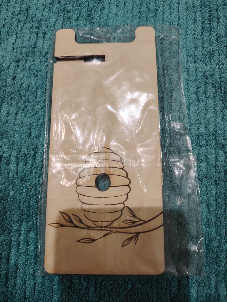 Wooden Phone Stand with Beehive Design image indicator(5)