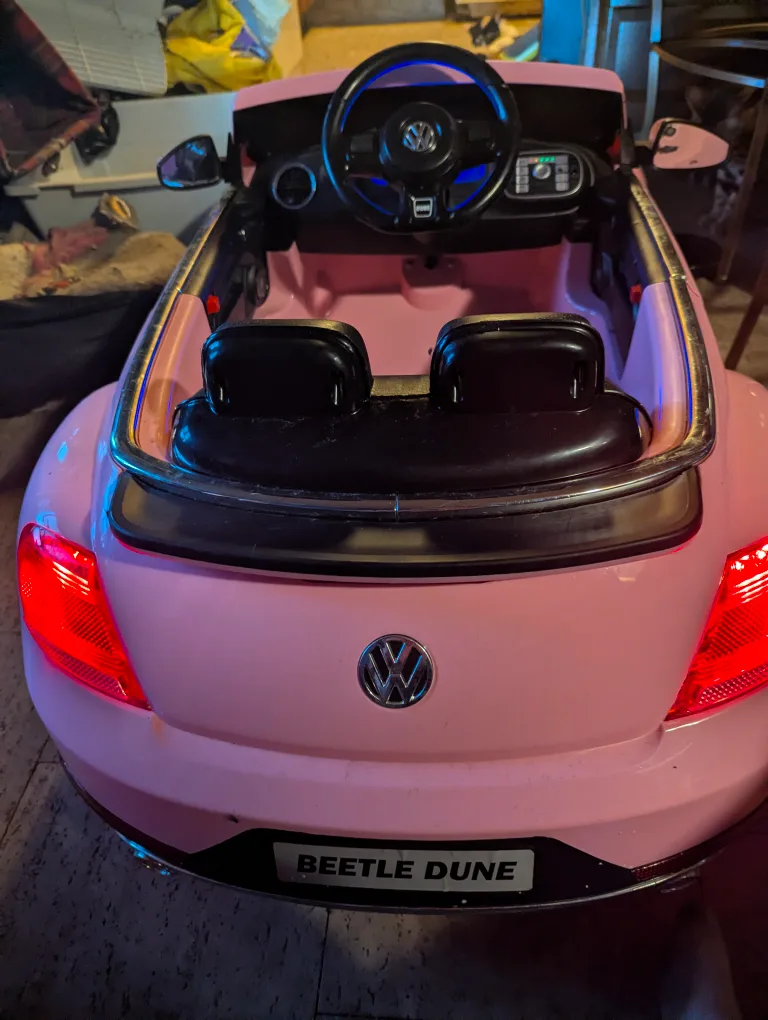 Pink VW electric kids car. thumbnail