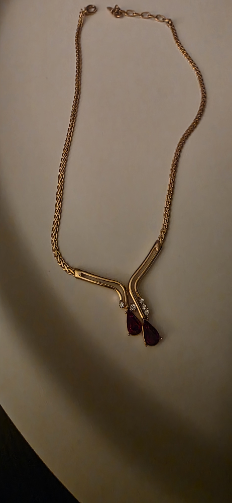 Elegant Gold-Tone Necklace with Red Teardrop Pendants
